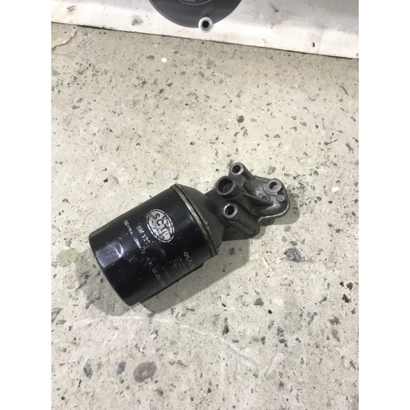 Корпус масляного фильтра (двигатель и элементы) BMW 3-series E30 11421289128