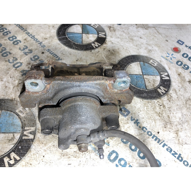 Суппорт тормозной (тормозная система) FORD Fusion MK5 2013 2.0 Hybrid DG9Z-2B121-A