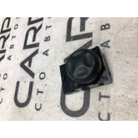 Кнопка регулювання сидіння