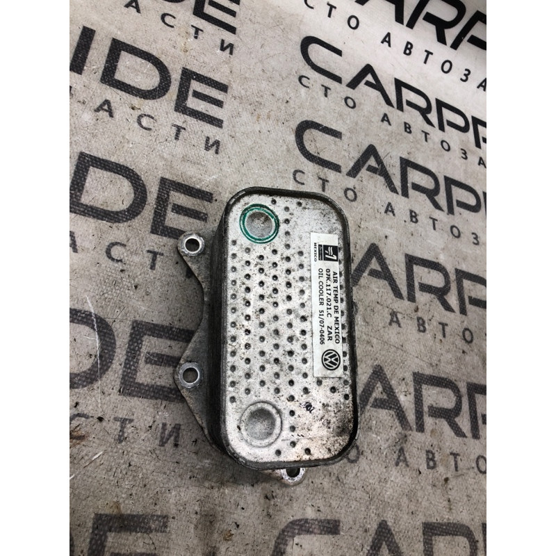 Теплообменник масляного фильтра (двигатель и элементы) Volkswagen Golf 1K 2.5 07k117021c