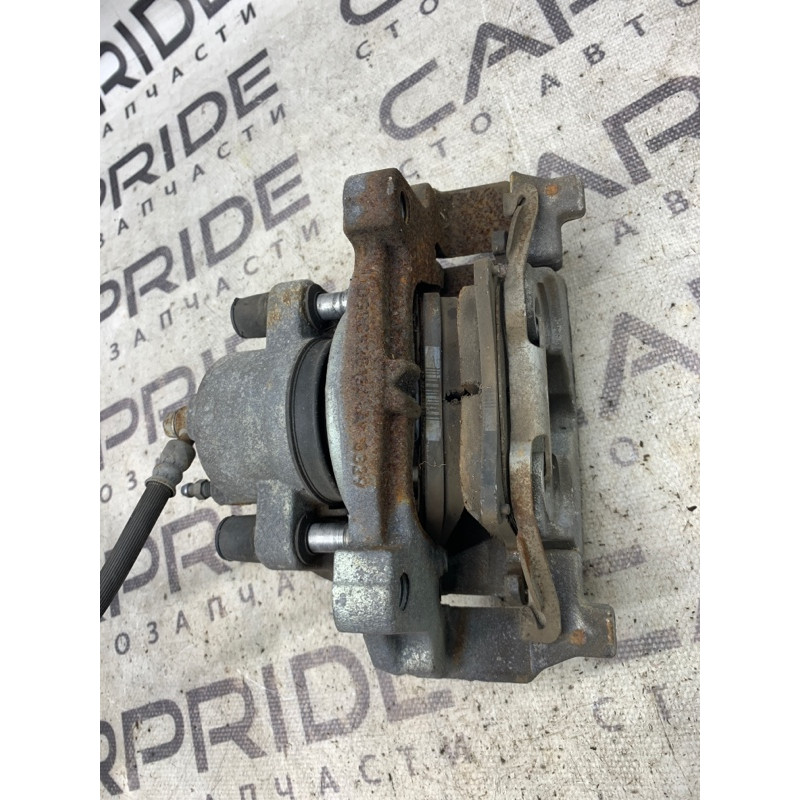 Суппорт тормозной (тормозная система) Ford Fusion MK5 DG9Z-2B121-A