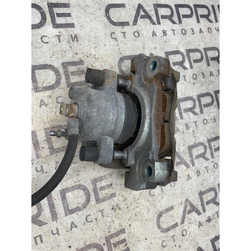 Суппорт тормозной (тормозная система) Ford Fusion MK5 DG9Z-2B121-A