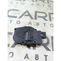 Привід заслонки обігрівача