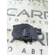 Привід заслонки обігрівача