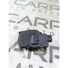 Привід заслонки обігрівача