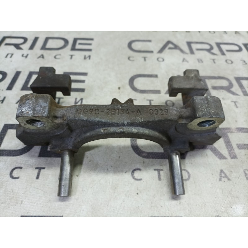 Скоба суппорта (тормозная система) Ford Fusion MK5 DG9Z-2B292-A