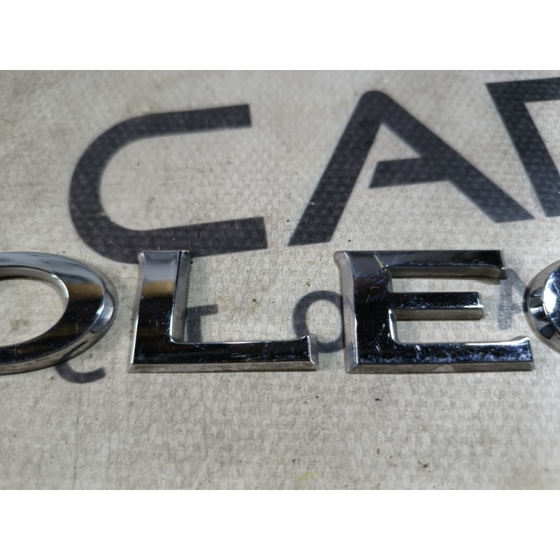 Эмблема (кузов и элементы) RENAULT Koleos HY 2008 2.0 90892JY00A