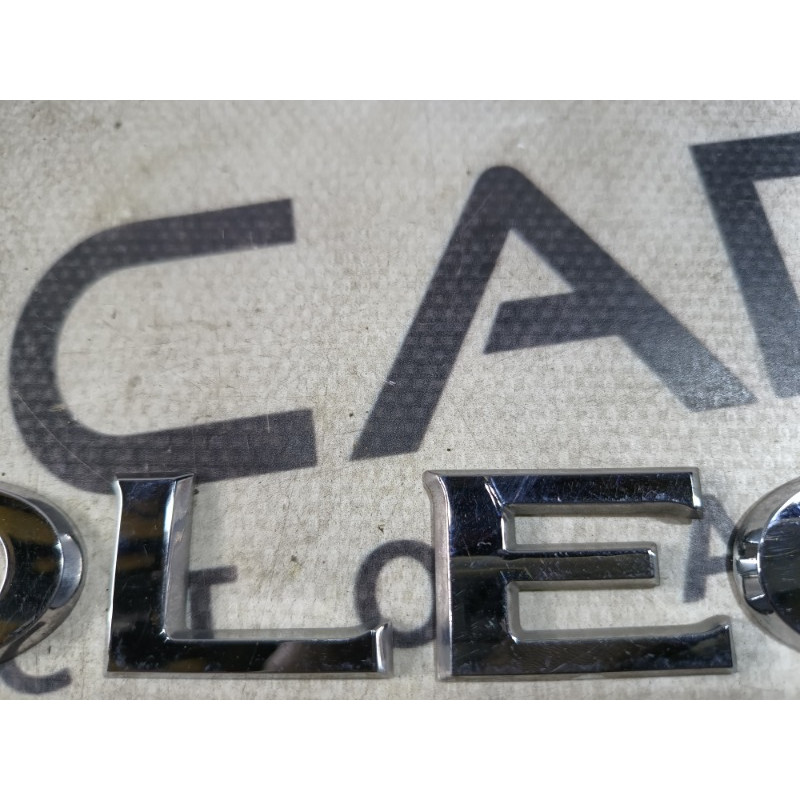 Эмблема (кузов и элементы) RENAULT Koleos HY 2008 2.0 90892JY00A