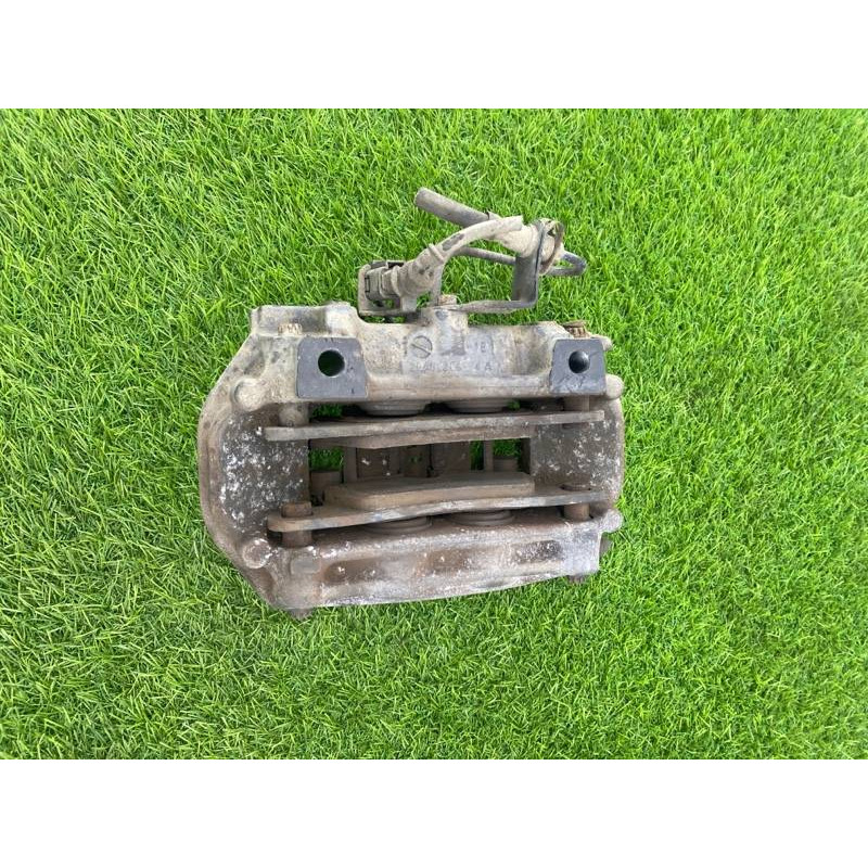 Гальмівний супорт (гальмівна система) Volkswagen Touareg NF 2013 3.0 TDI CRCA 7P6615424D