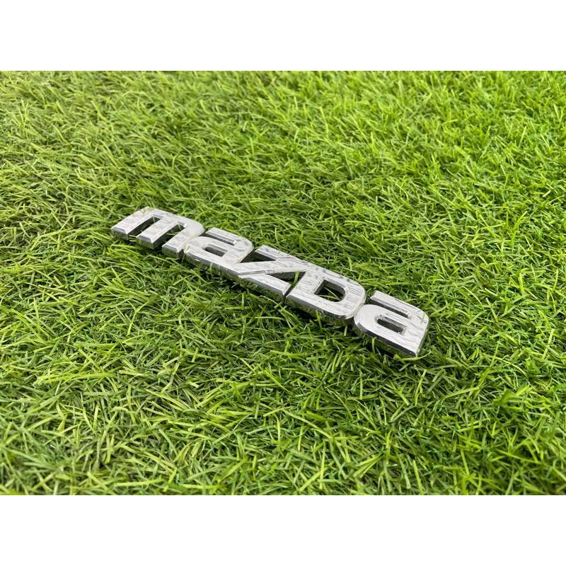 Эмблема (кузов и элементы) Mazda 6 GG 2004 2.0 RF5 GJ6A51711