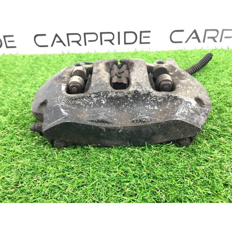 Гальмівний супорт (гальмівна система) Volkswagen Touareg II NF 2013 3.0 TDI 7P6615424D