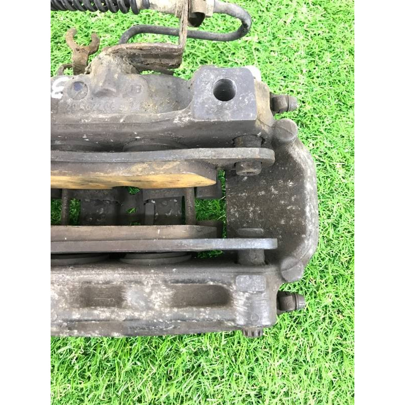 Гальмівний супорт (гальмівна система) Volkswagen Touareg II NF 2013 3.0 TDI 7P6615424D