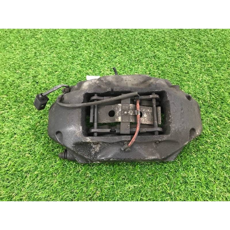 Гальмівний супорт (гальмівна система) Volkswagen Touareg II NF 2013 3.0 TDI 7L6615150A