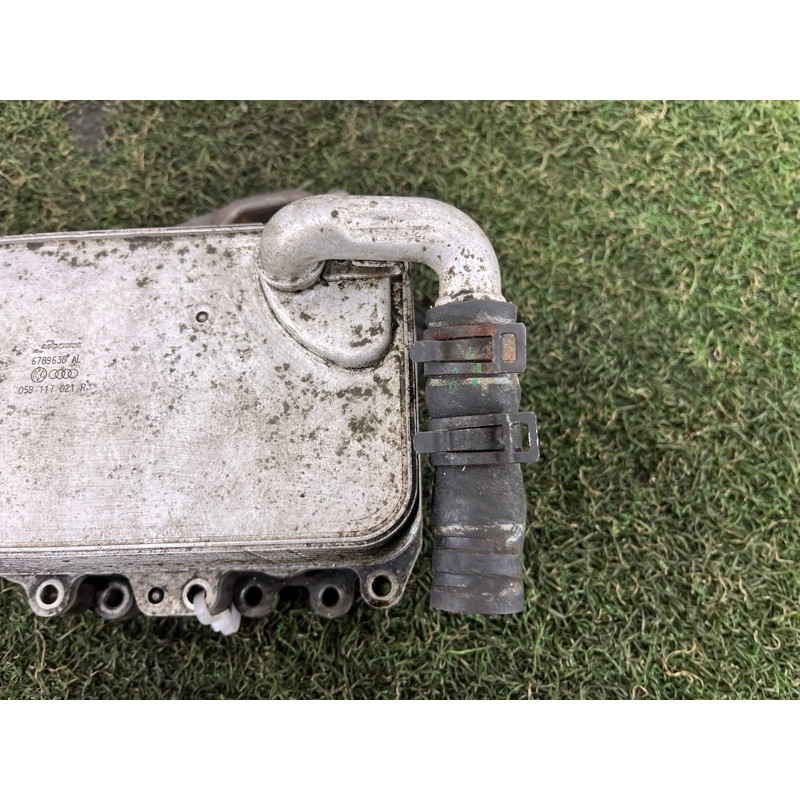 Теплообмінник масляного фільтра (двигун та елементи) Volkswagen Touareg II NF 2013 3.0 059117021R
