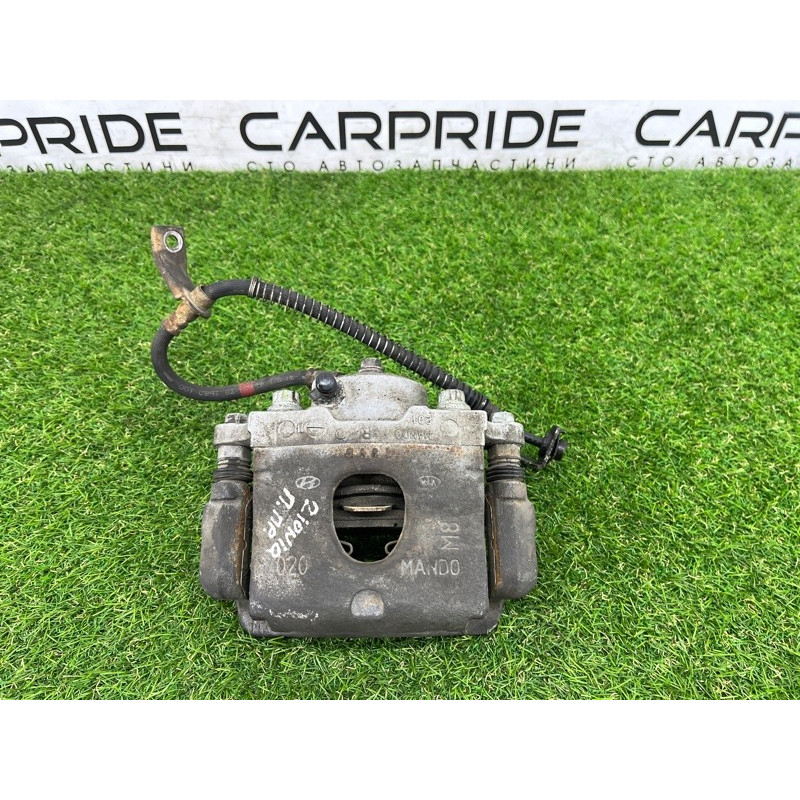 Суппорт тормозной (тормозная система) Hyundai Ioniq AE 2019 Electro 58130G2000