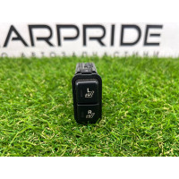 Кнопка обігріву сидіння