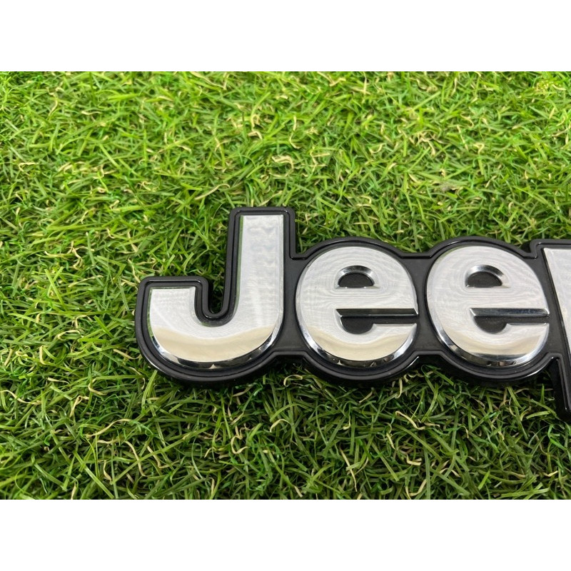Емблема (кузов і елементи) Jeep Cherokee KL 2014 3.2 68348320AB