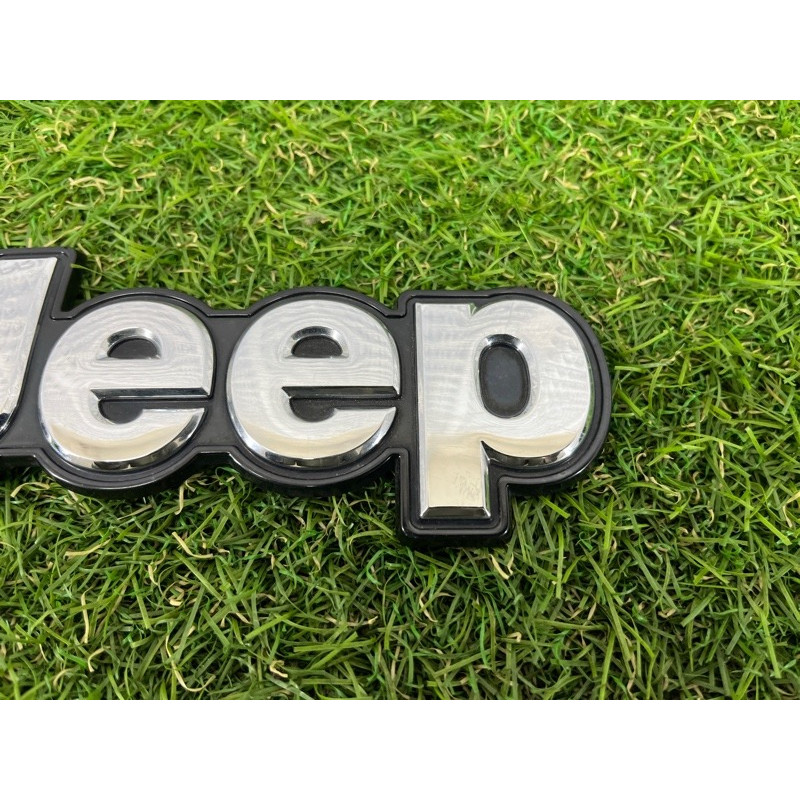 Емблема (кузов і елементи) Jeep Cherokee KL 2014 3.2 68348320AB