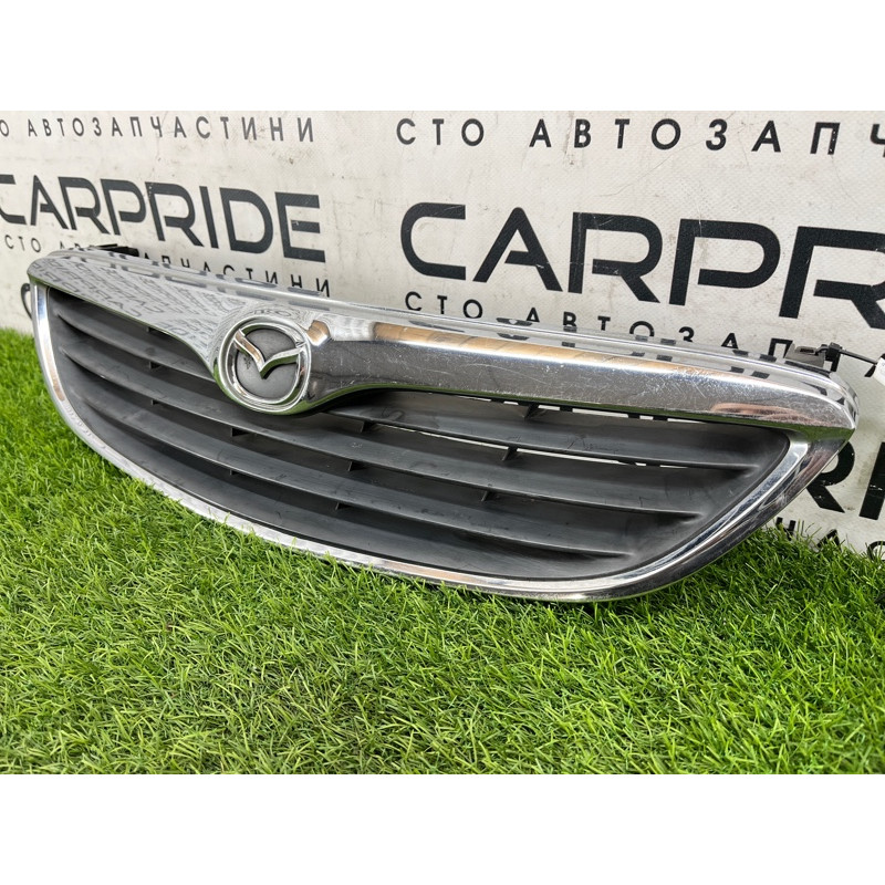 Решетка радиатора (наружные элементы кузова) Mazda 626 GF gd7a50710
