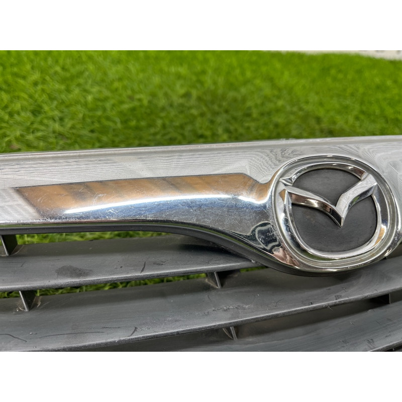 Решетка радиатора (наружные элементы кузова) Mazda 626 GF gd7a50710