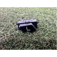 Кнопка регулювання сидіння