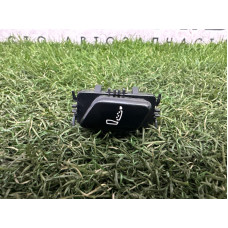 Кнопка регулювання сидіння